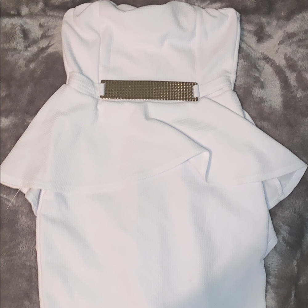 A white and gold dress.